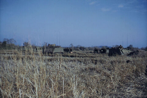 Australian M113 APCs at Laager, the crews having breakfast inside the area that was fenced immediately east of Xa Phuoc Loi. This area became part of the fenced minefield