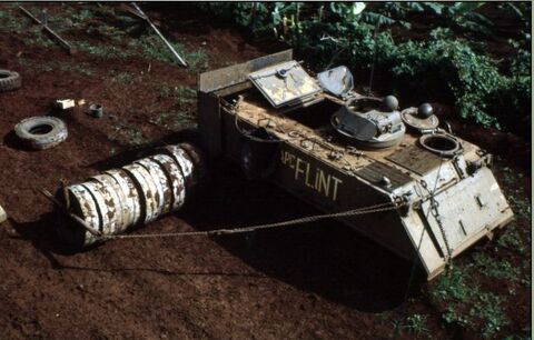 HMAPC Flint Notice the canvas bag on the side. This was SUPPOSED to be used for collecting un-exploded mines. You were SUPPOSED to get off the carrier and with a large set of tongs pick up the mine and place it in the bag....Really?