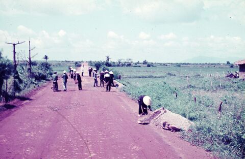 Repairing road east of Hoa Long village