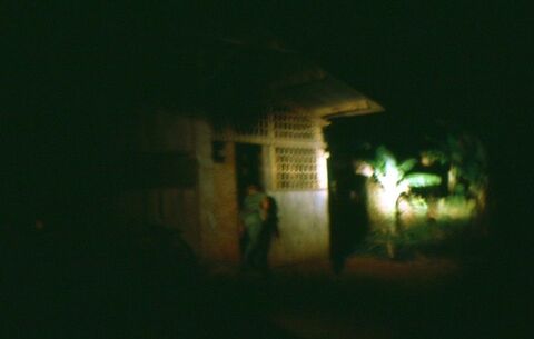 Regional SVN forces conducting a house to house search during a sweep of the village aided by the Centurion tank search light.