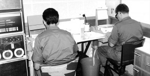 Hard at work. Staff of the Detachment,1 Division Intelligence Unit enter INTSUM data into an early model computer at Nui Dat. Although this early attempt at automated intelligence analysis seems to have produced very limited results at the time, the data collected formed the basis of the ‘Phuoc Tuy Incident Database 1966-1971’ which now supports much of our analysis.